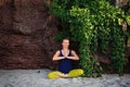 Portrait of happiness young woman practicing yoga on outdoors.Yoga and relax concept. Beautiful girl practice asana Royalty Free Stock Photo