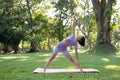 Portrait of happiness young woman practicing yoga on outdoors.Yoga and relax concept. Beautiful girl practice asana Royalty Free Stock Photo