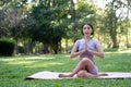 Portrait of happiness young woman practicing yoga on outdoors.Yoga and relax concept. Beautiful girl practice asana Royalty Free Stock Photo