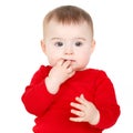 Portrait of a happy adorable Infant child baby girl lin red sitting happy smiling on a white background Royalty Free Stock Photo