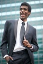Portrait of a happy african american businessman smiling outside Royalty Free Stock Photo