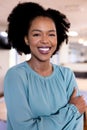 Portrait of happy african american businesswoman in modern office Royalty Free Stock Photo