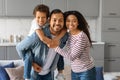 Portrait Of Happy African American Family Of Three Posing Together At Home Royalty Free Stock Photo