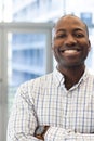 Portrait of happy african american man in hospital waiting room Royalty Free Stock Photo