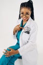 Portrait of happy african american nurse or doctor woman with stethoscope Royalty Free Stock Photo