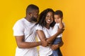 Portrait of happy african parents with their son on hands Royalty Free Stock Photo