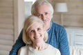 Portrait of happy aged couple hugging making picture together Royalty Free Stock Photo