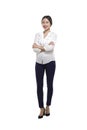 Portrait of a happy asian business woman standing with folded ha