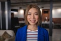 Portrait of happy asian businesswoman standing in an office room smiling Royalty Free Stock Photo