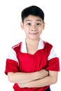 Portrait of Happy asian cute boy in red sport uniform Royalty Free Stock Photo
