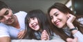 Portrait Happy Asian Family in bedroom. Royalty Free Stock Photo