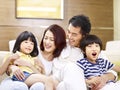 Portrait of happy asian family