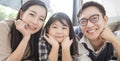 Portrait of happy asian family spending time together in living room. family and home concept. Royalty Free Stock Photo