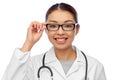 Portrait of happy asian female doctor in glasses Royalty Free Stock Photo