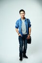 Portrait of a happy asian man with bag Royalty Free Stock Photo