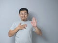 Man Making Pledge Gesture, Hand on Chest, Making Promise Royalty Free Stock Photo