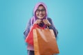 Happy Muslim Woman Bring Shopping Bags