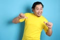 Happy Asian Man Smiling and Pointing Himself Royalty Free Stock Photo