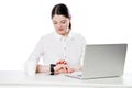 Portrait of happy attractive brunette businesswoman in white shirt sitting looking and touching her smartwatch display, reading Royalty Free Stock Photo