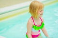 Portrait of happy baby girl in swimming pool Royalty Free Stock Photo