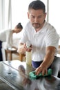 portrait happy bar tender cleaning bar counter Royalty Free Stock Photo