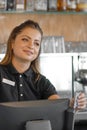 The waitress at the cash register Royalty Free Stock Photo