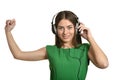 Happy beautiful girl listening to music in headphones Royalty Free Stock Photo