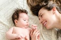 Portrait of happy beautiful mother and cute newborn baby girl Royalty Free Stock Photo