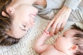 Portrait of happy beautiful mother and cute newborn baby girl Royalty Free Stock Photo
