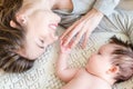 Portrait of happy beautiful mother and cute newborn baby girl Royalty Free Stock Photo