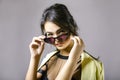 Portrait of a happy beautiful young woman in stylish sunglasses Royalty Free Stock Photo