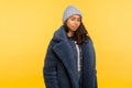 Portrait of happy beautiful young woman wearing warm winter hat and fur coat smiling, glamour fashion model Royalty Free Stock Photo