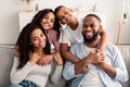 Portrait of happy black family smiling at home Royalty Free Stock Photo