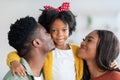 Portrait Of Happy Black Family, Young Parents And Cute Little Daughter Royalty Free Stock Photo