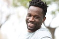 Happy black man with perfect smile looking at camera Royalty Free Stock Photo