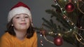 Portrait of happy boy near Christmas tree Royalty Free Stock Photo