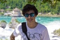 Portrait of happy boy in rhine falls in Switzerland Royalty Free Stock Photo