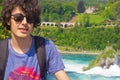 Portrait of happy boy in rhine falls in Switzerland Royalty Free Stock Photo