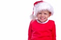 Portrait of happy boy in Santa hat and red Christmas costume looking at camera and smiling. isolated on white background Royalty Free Stock Photo