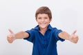 Portrait of happy boy showing thumbs up gesture Royalty Free Stock Photo