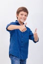 Portrait of happy boy showing thumbs up gesture Royalty Free Stock Photo