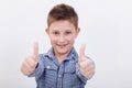 Portrait of happy boy showing thumbs up gesture Royalty Free Stock Photo