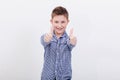 Portrait of happy boy showing thumbs up gesture Royalty Free Stock Photo