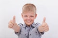 Portrait of happy boy showing thumbs up gesture Royalty Free Stock Photo