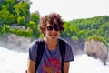 Portrait of happy boy in rhine falls in Switzerland Royalty Free Stock Photo