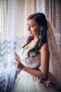 Portrait of a bride near the window Royalty Free Stock Photo