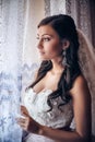 Portrait of a bride near the window Royalty Free Stock Photo