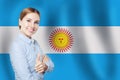 Portrait of happy busines woman on the Argentina flag background