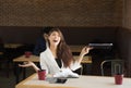 Portrait of happy business woman in coffee shop,Having enjoyed a really impressive success Royalty Free Stock Photo