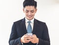 Portrait of  happy  businessman using mobile phone Royalty Free Stock Photo